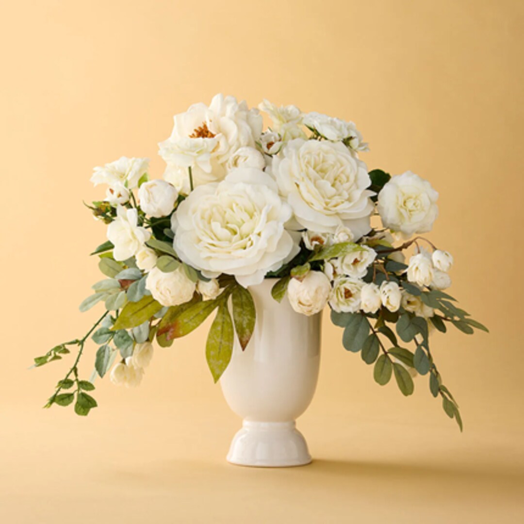 A group of flowers in baskets